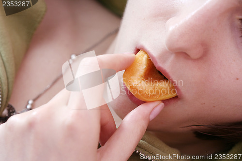 Image of Women with apricot 