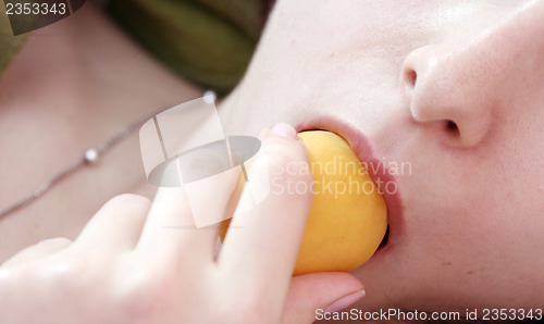 Image of Women with apricot 