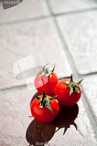 Image of three cherry tomatoes 