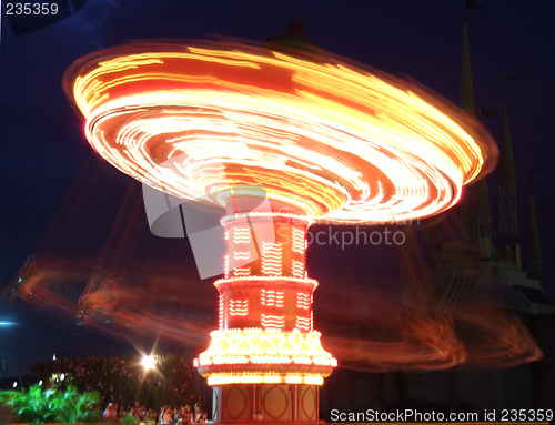 Image of Spinner in the amusement park at night