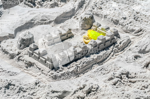 Image of sand castle structures built at seashore