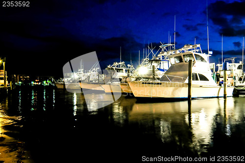 Image of Marina with docked boats at the end of the day