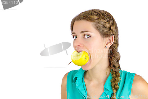 Image of Girl taking a bite of an apple.