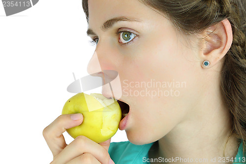 Image of Girl taking a bite of an apple.