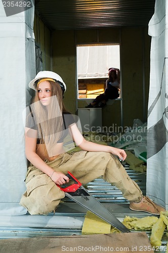 Image of portrait of woman on construction site