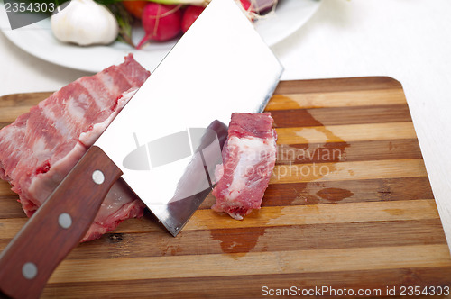 Image of fresh pork ribs and vegetables