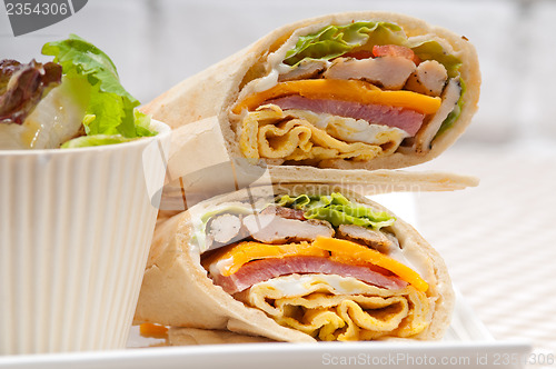 Image of club sandwich pita bread roll