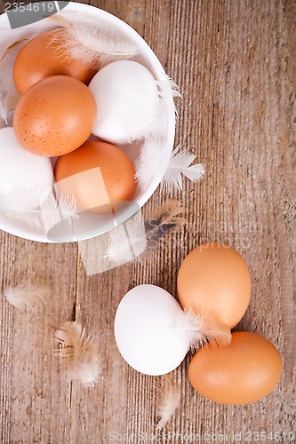 Image of brown and white eggs in a bowl