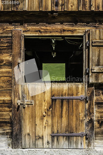 Image of Wooden door of stable