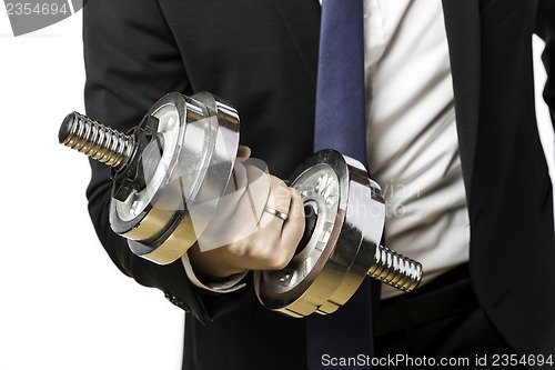 Image of Businessman with silver dumbbell