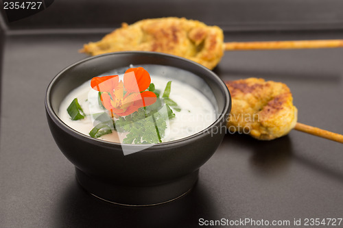 Image of Chicken skewers and bowl