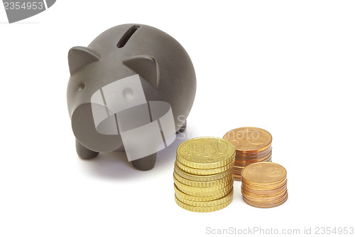 Image of Black piggy bank and coins