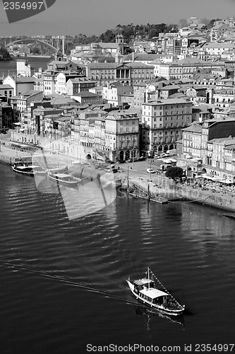 Image of Portugal. Porto city. View of Douro river embankment  in black a