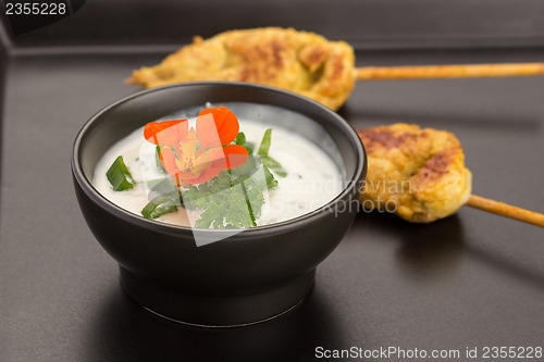 Image of Chicken skewers and bowl