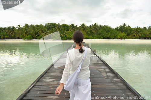 Image of young woman relax on cloudy summer day