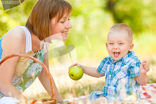 Image of Mom and son have a picnic