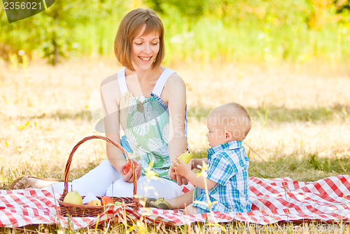 Image of Mom and son have a picnic