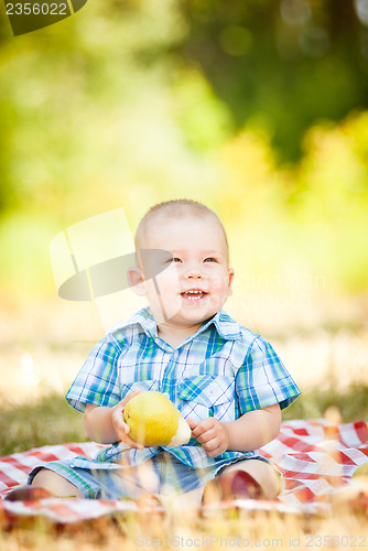 Image of cute little baby have a picnic