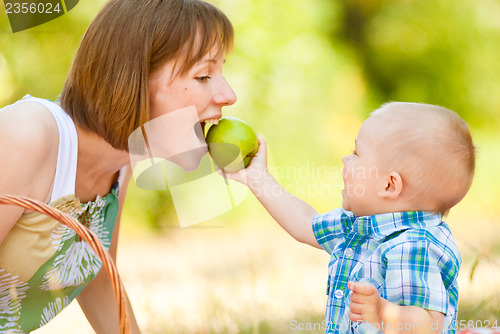 Image of Mom and son have a picnic