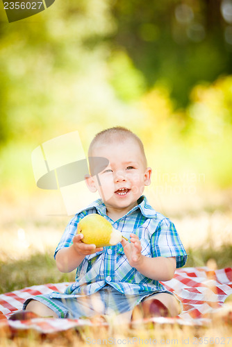 Image of cute little baby have a picnic