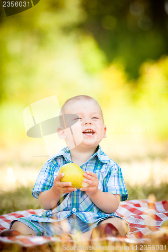 Image of cute little baby have a picnic