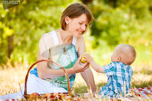 Image of Mom and son have a picnic