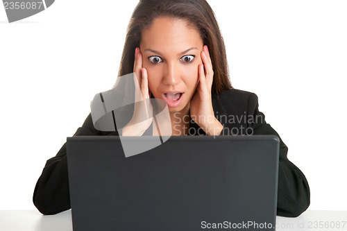 Image of Woman in Panic Looking At A Computer Monitor