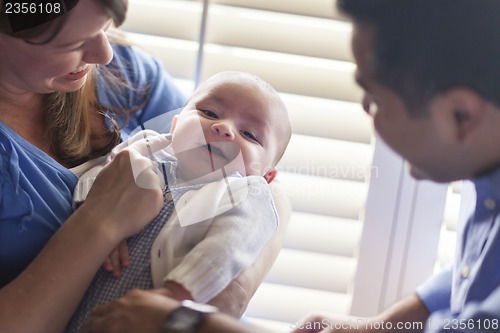 Image of Mixed Race Couple Enjoying Their Newborn Son