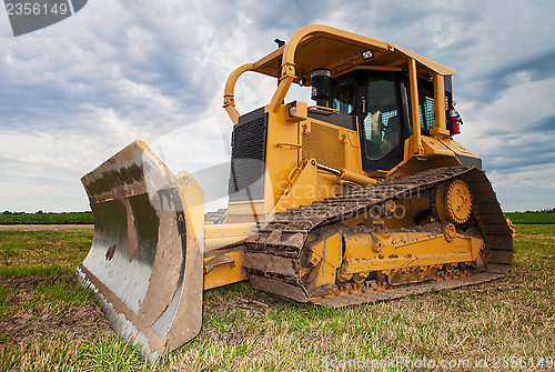 Image of Large yellow bulldozer