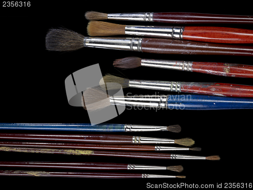 Image of used paintbrushes