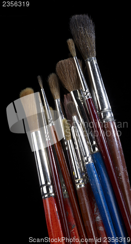 Image of used paintbrushes