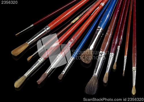 Image of used paintbrushes
