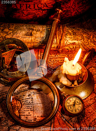 Image of Vintage still life. Vintage items on ancient map.