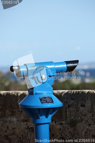 Image of Tourist viewing telescope