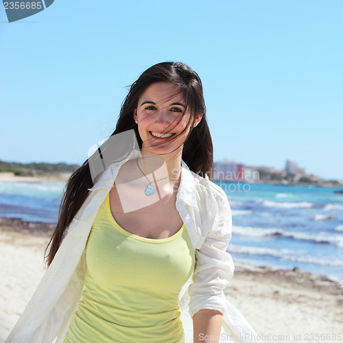 Image of Beautiful woman on a tropical beach