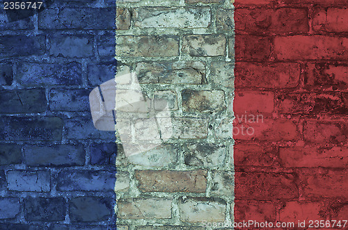 Image of Flag of France on brick background