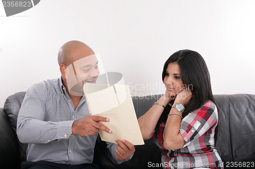 Image of Husband and wife during a consultation 