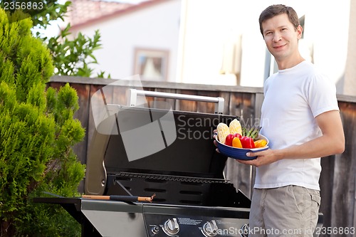 Image of man preparing food