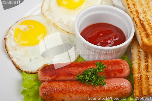 Image of Fried eggs with sausages