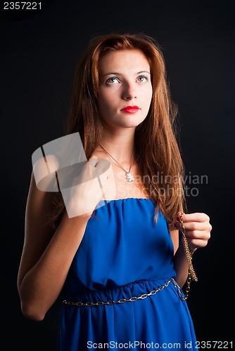 Image of beautiful young red haired woman