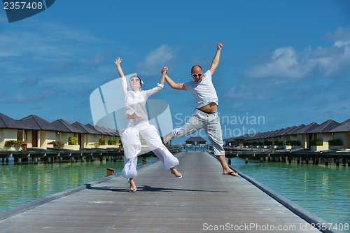 Image of happy young couple have fun on summer
