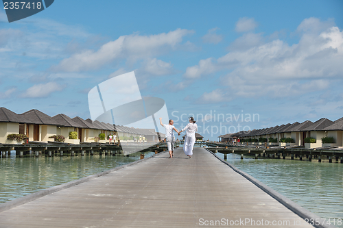 Image of happy young couple have fun on summer