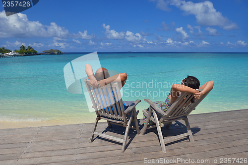 Image of happy young couple have fun on summer
