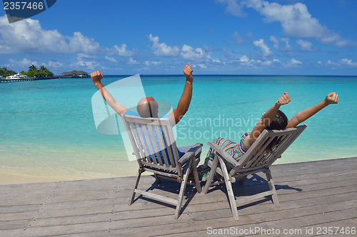Image of happy young couple have fun on summer