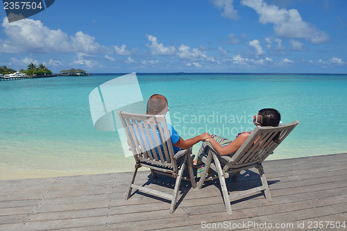 Image of happy young couple have fun on summer