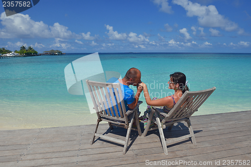Image of happy young couple have fun on summer