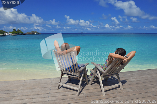 Image of happy young couple have fun on summer