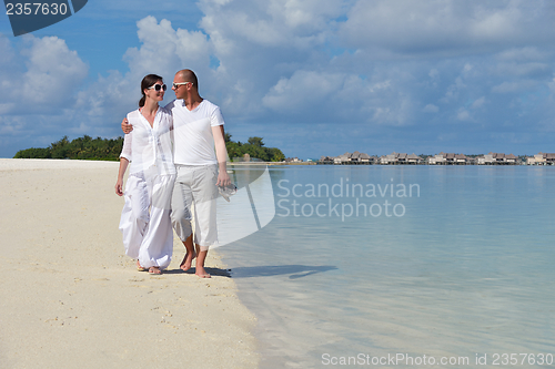 Image of happy young couple have fun on summer