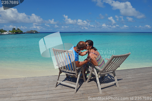 Image of happy young couple have fun on summer