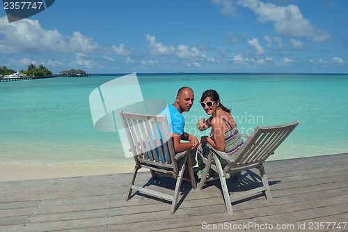 Image of happy young couple have fun on summer